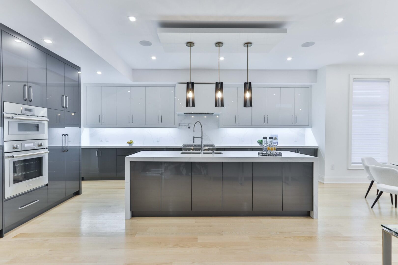 Modern custom kitchen cabinets with wood doors in a Toronto home